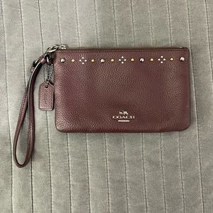 Dark purple coach wristlet